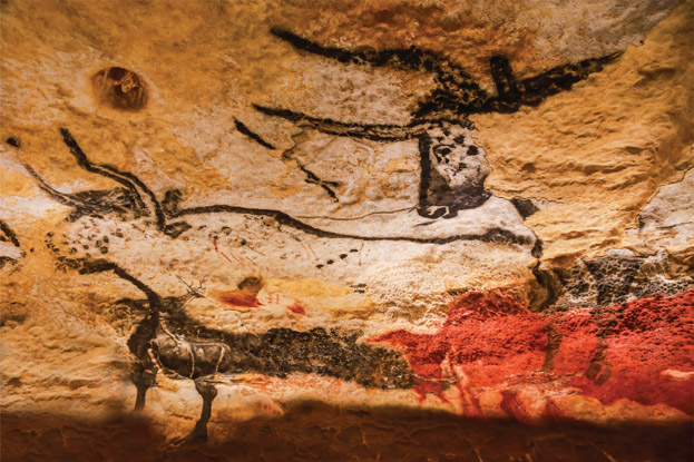Figures 1-2a and 1-2b Cave art from Lascaux, France, dated more than 17,000 years ago. This art shows humans hunting animals with a bow and arrow. The picture on the right shows realistic depictions of animals.