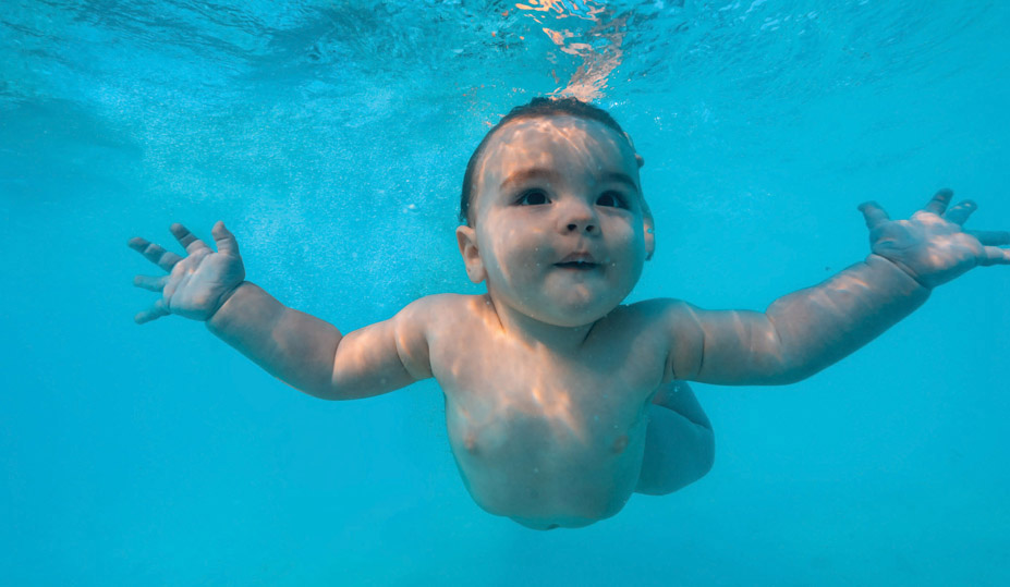 Figure 4-8 Infant showing swimming reflex.